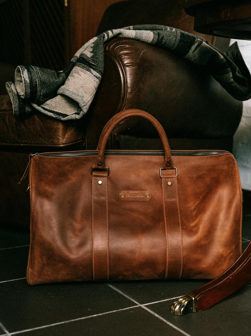 Leather weekender deals